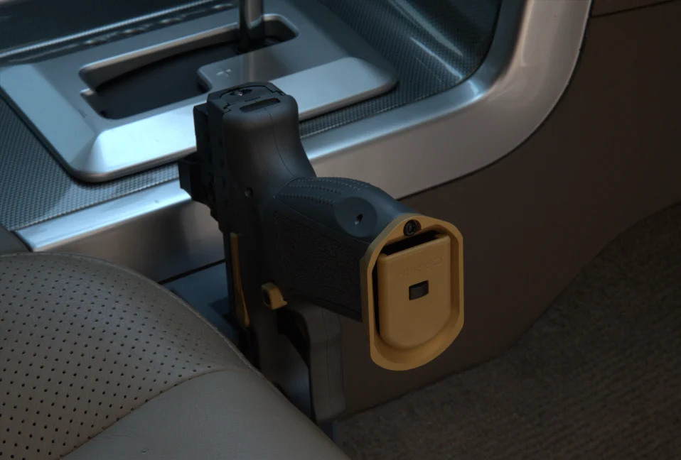 At The Ready pistol mount beside a vehicle center console